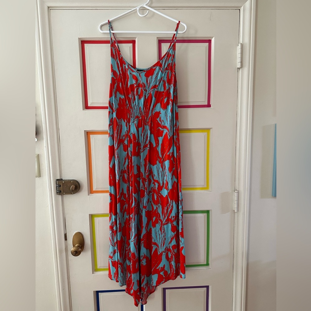 Long handkerchief hem tropical sundress. city Chic
